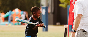 Toddler playing with soccer ball